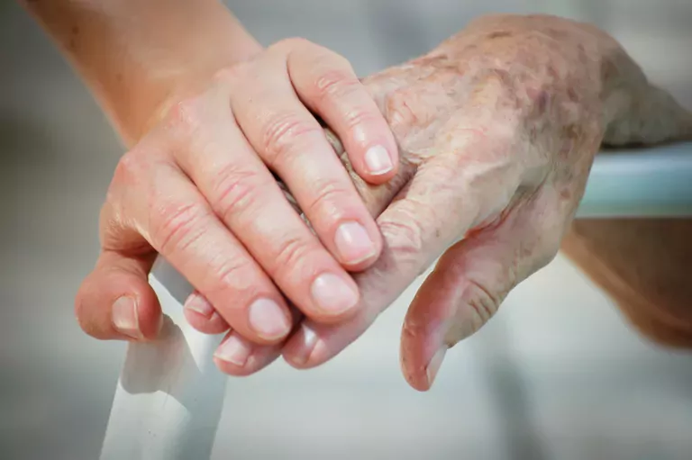 Hands holding each other